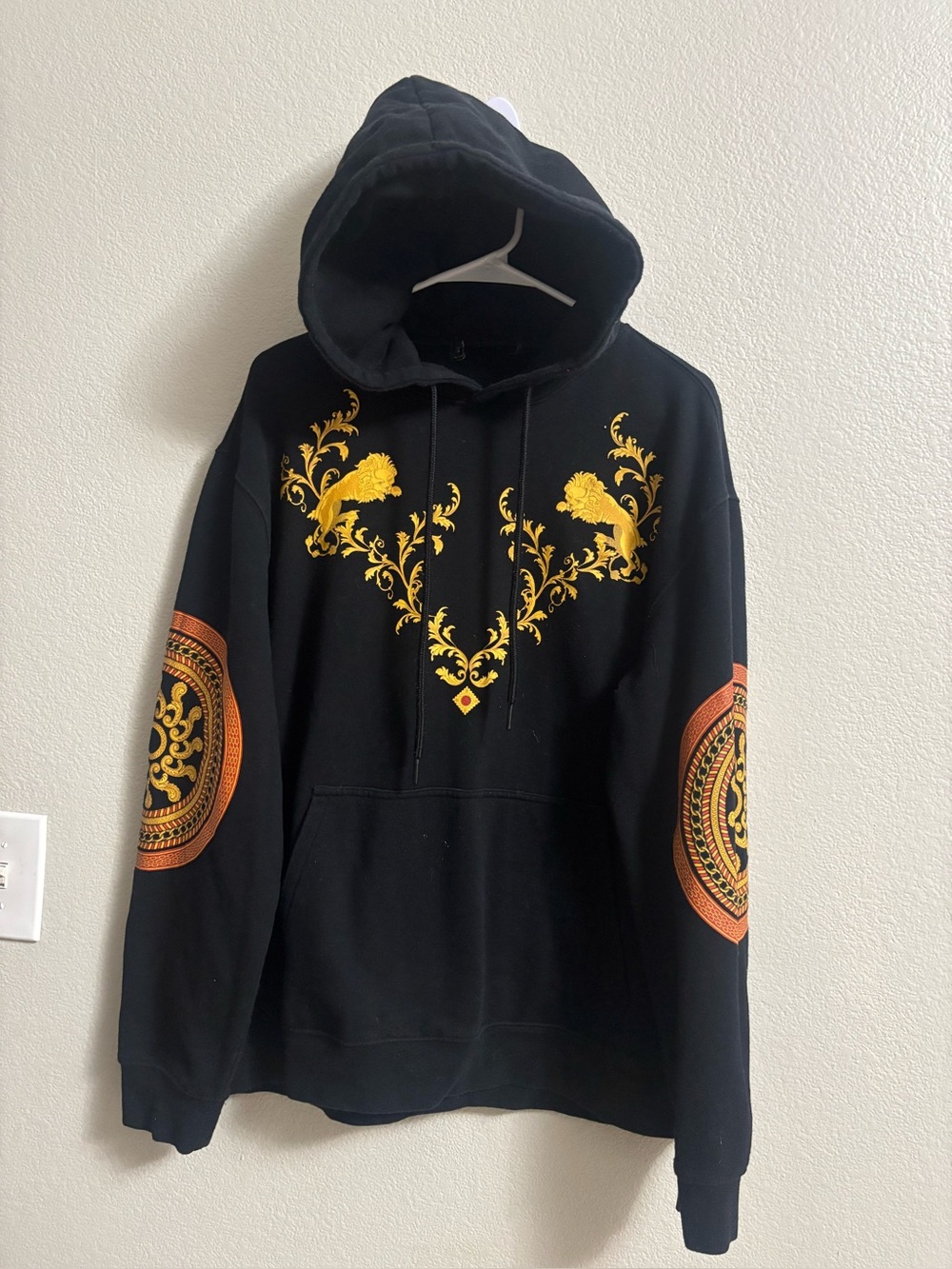 Source Unknown Black Hoodie with Gold and Orange Ornamental Print